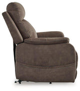 Ashley Furniture Crestmeade Power Lift Recliner in brown fabric with plush cushioning and a built-in lift mechanism.