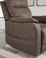 Ashley Furniture Crestmeade Power Lift Recliner in plush fabric with padded armrests and a supportive backrest.