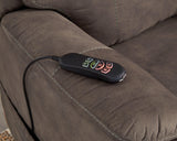 Ashley Furniture Crestmeade Power Lift Recliner in plush fabric with armrests and built-in control for easy reclining and lifting.