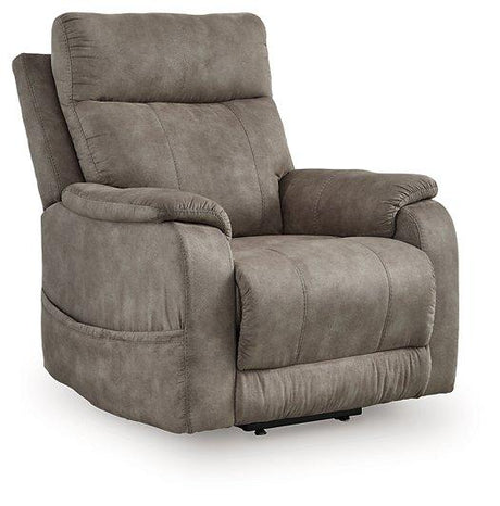 Ashley Furniture Crestmeade power lift recliner in brown fabric, showing plush cushioning and adjustable reclining features.