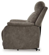 Ashley Furniture Crestmeade power lift recliner with plush upholstery and padded armrests, designed for comfort and support.