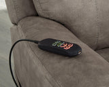 Ashley Furniture Crestmeade Power Lift Recliner with plush upholstery and adjustable backrest for comfort and support.