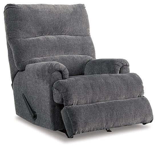 Ashley Furniture Man Fort Recliner showing a comfortable padded recliner chair with plush upholstery and armrests.