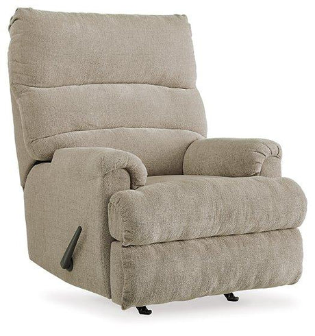 Ashley Furniture Man Fort Recliner with plush cushioning and dark brown upholstery, designed for comfortable seating.