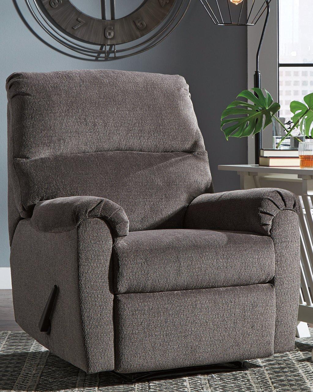 Ashley Nerviano recliner in neutral fabric, showing plush cushioning and reclining mechanism for comfortable seating.