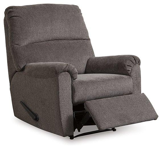 Comfortable Ashley Nerviano recliner with plush upholstery and padded armrests, perfect for relaxing in the living room.