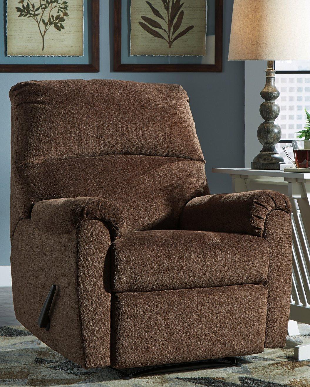 Nerviano recliner by Ashley Furniture featuring plush upholstery and a modern design, shown in a cozy living room setting.