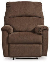 Ashley Furniture Nerviano recliner with plush cushioning and wooden legs, shown in a cozy living room setting.