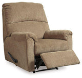 Comfortable Ashley Furniture Nerviano recliner with plush upholstery and padded armrests, perfect for relaxing in any living room.