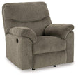 Ashley Alphons recliner in a cozy living room setting, showcasing plush fabric, padded armrests, and a modern reclining design.