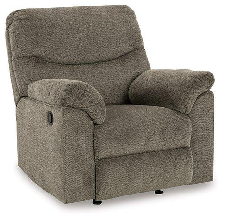 Ashley Alphons recliner in a cozy living room setting, showcasing plush fabric, padded armrests, and a modern reclining design.