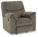 Ashley Alphons recliner in a cozy living room setting, showcasing plush fabric, padded armrests, and a modern reclining design.