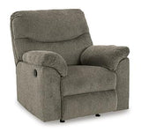 Comfortable Alphons recliner by Ashley Furniture with plush upholstery and padded armrests, perfect for relaxing in the living room.