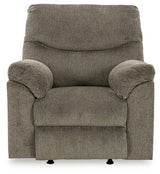 Comfortable Ashley Alphons Recliner with plush fabric upholstery and padded armrests, perfect for relaxation.