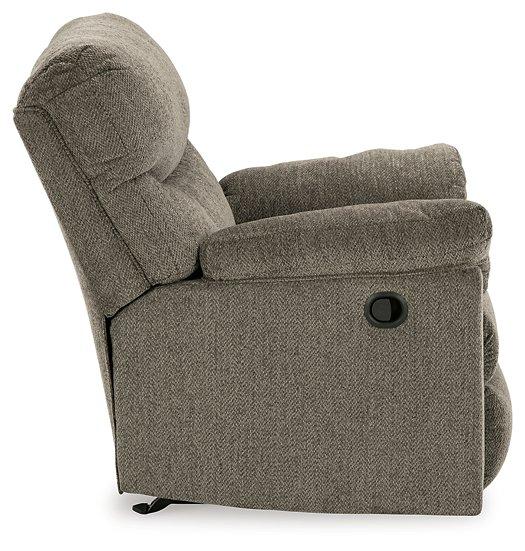 Ashley Furniture Alphons Recliner showing plush beige upholstery and padded armrests in a modern living room setting.