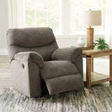 Comfortable Ashley Alphons Recliner with plush fabric and padded armrests, designed for relaxation and style.