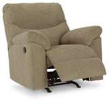 Comfortable Ashley Alphons Recliner with plush cushioning and dark upholstery, perfect for relaxing living room seating.