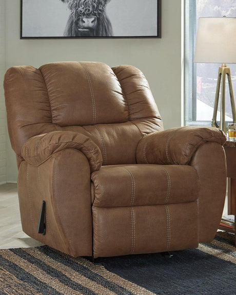 Comfortable Ashley Furniture McGann Recliner with plush cushioning and armrests, perfect for relaxing living room seating.
