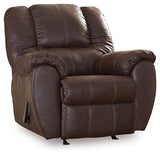 Comfortable McGann recliner by Ashley Furniture with plush upholstery and padded armrests, perfect for relaxing in the living room.