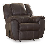 Ashley Furniture McGann recliner with plush upholstery and padded armrests, shown in a cozy living room setting.