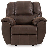 Comfortable Ashley Furniture McGann Recliner in a cozy living room setting with plush fabric and cushioned armrests.