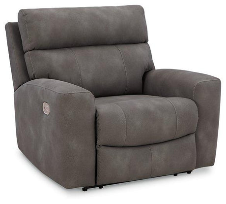 Ashley Furniture Next-Gen DuraPella Power Recliner with plush cushioning and modern design, shown in a cozy living room setting.