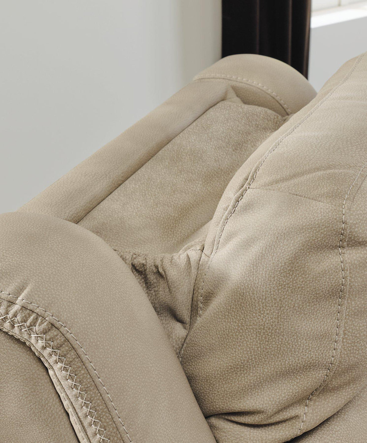 Ashley Furniture Next-Gen DuraPella Power Recliner with plush fabric and modern design, showing the reclined position and armrests.