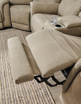 Ashley Furniture Next-Gen DuraPella Power Recliner with plush upholstery and adjustable headrest, shown in a cozy living room setting.