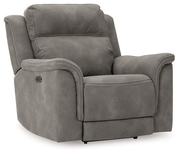 Ashley Furniture Next-Gen DuraPella power recliner with plush cushioning and modern design, shown in a cozy living room setting.