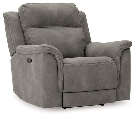 Ashley Furniture Next-Gen DuraPella power recliner with plush cushioning and modern design, shown in a cozy living room setting.