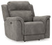 Ashley Furniture Next-Gen DuraPella power recliner with plush cushioning and modern design, shown in a cozy living room setting.