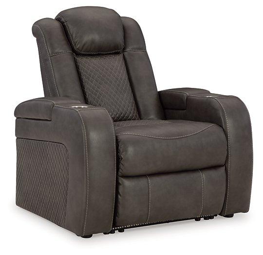 Comfortable Ashley Furniture Fyne-Dyme Power Recliner with plush upholstery and reclining mechanism for relaxed seating.