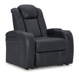 Ashley Furniture Fyne-Dyme Power Recliner showing plush fabric, padded armrests, and a reclining mechanism for comfort and support.