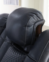 Ashley Furniture Fyne-Dyme Power Recliner showing plush upholstery and reclining mechanism in a modern living room setting