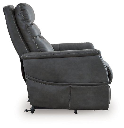 Ashley Furniture Strawbill Power Lift Recliner with padded armrests and plush upholstery, showing the reclined position.