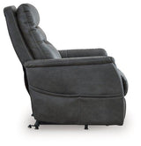 Ashley Furniture Strawbill Power Lift Recliner with padded armrests and plush upholstery, showing the reclined position.