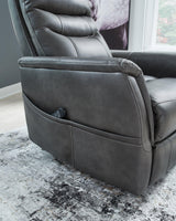Ashley Furniture Strawbill Power Lift Recliner in beige fabric with plush cushioning and a built-in power reclining mechanism.
