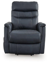 Ashley Furniture Strawbill Power Lift Recliner in brown leather with plush cushioning and built-in footrest.