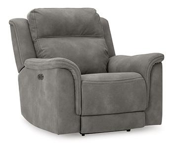 Next-Gen DuraPella Power Recliner by Ashley Furniture showing plush padded armrests and a reclining mechanism in a living room setting.
