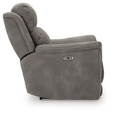 Ashley Furniture Next-Gen DuraPella power recliner with plush fabric and padded armrests, shown from a side view.
