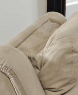 Ashley Furniture Next-Gen DuraPella power recliner with plush upholstery and adjustable headrest, shown in a modern living room setting.