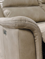 Ashley Furniture Next-Gen DuraPella power recliner with stitched leather upholstery and padded armrests for comfort.