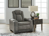 Ashley Furniture Next-Gen DuraPella Power Recliner in dark leather, showcasing plush cushioning and a sleek, modern design.