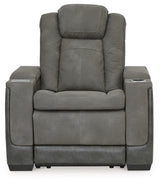 Ashley Furniture Next-Gen DuraPella Power Recliner showing plush fabric and padded armrests from a front head-on view.