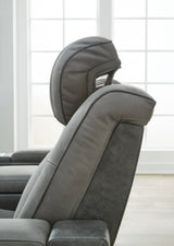 Ashley Furniture Next-Gen DuraPella Power Recliner, brown fabric with plush cushioning and adjustable headrest.