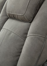 Close-up of the stitching detail on the Next-Gen DuraPella Power Recliner by Ashley Furniture, showcasing its premium upholstery and craftsmanship.
