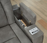 Ashley Furniture Next-Gen DuraPella Power Recliner with storage arm, featuring plush cushioning and a sleek modern design.