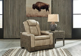 Ashley Furniture Next-Gen DuraPella power recliner in dark fabric, showing the closed recline position and plush cushioning.