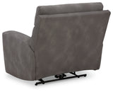 Ashley Furniture Next-Gen DuraPella Power Recliner with plush upholstery and sleek design, shown from the back in a modern living room setting.