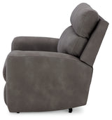 Ashley Furniture Next-Gen DuraPella power recliner with plush cushioning and dark brown leather upholstery, side view.